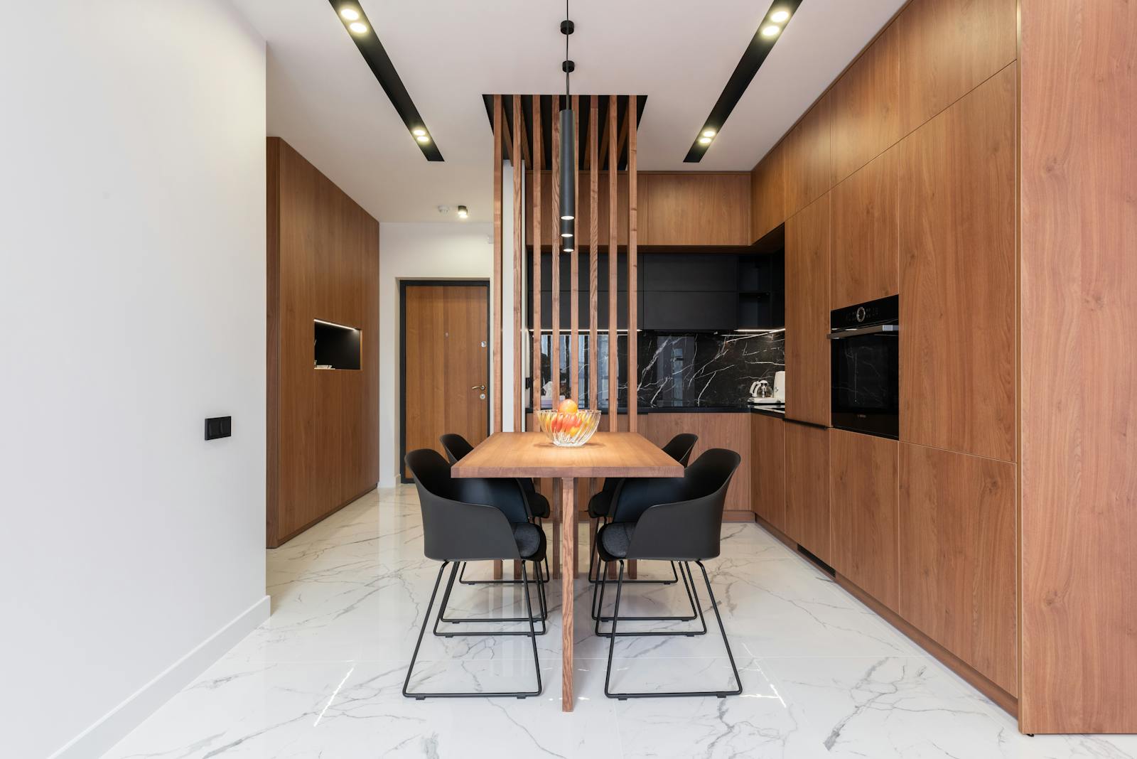 Spacious and stylish kitchen interior with wooden cabinets and dining area. types of cabinets