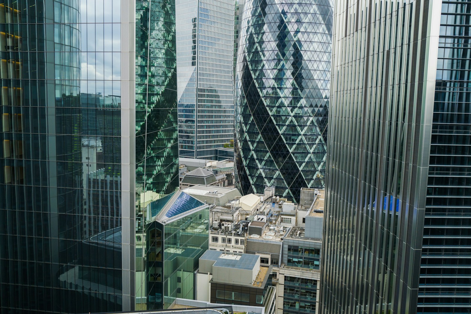 a view of some very tall buildings in the city Office Buildings
