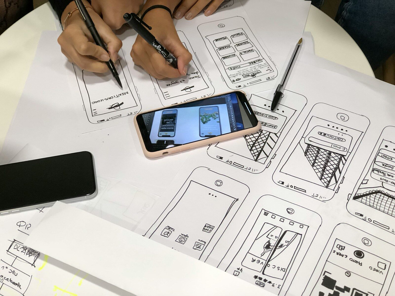 black Android smartphone and pink case The Role of a Design Engineer in Complex Construction Projects