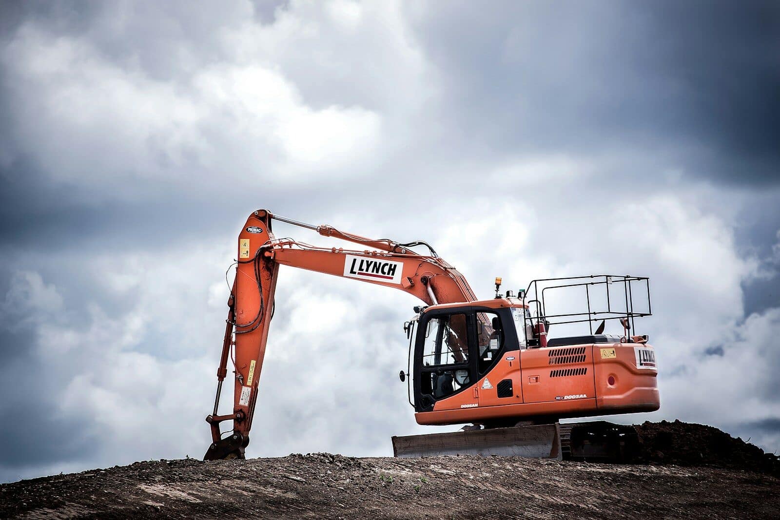 orange excavator Construction Types: A Guide To Commercial Building Projects